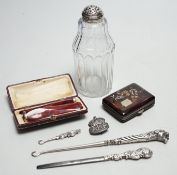A Georgian silver mounted sugar sifter, a tortoiseshell and plique case, four silver items and two