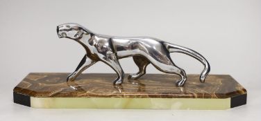 A French Art Deco silvered bronze ‘panther’ by Decoux, on marble base 38cm long