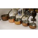 Five French copper graduated saucepans