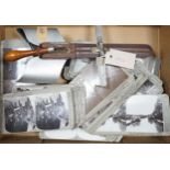 A collection of WWI stereoscopic slides and a viewer