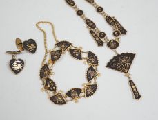 A Japanese gilt damascened iron work suite of jewellery: necklace, bracelet and a pair of cuff