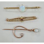 A novelty yellow metal, white opal and diamond set 'treble clef' stick pin, 60mm, a 15ct and white