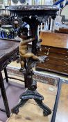 An early 20th century Italian carved walnut and softwood torchere, height 90cm