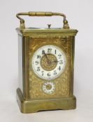 An early 20th century French brass sonnerie repeating carriage clock with alarm, 15cm tall
