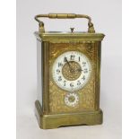 An early 20th century French brass sonnerie repeating carriage clock with alarm, 15cm tall