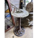 A cast and oxidised metal sundial, height 81cm