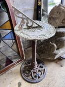 A cast and oxidised metal sundial, height 81cm