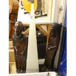A pair of large African hardwood figural carvings and a Mathmos floor lamp