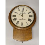 A Victorian oak single fusee drop dial wall clock