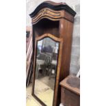 A 19th century French walnut and ebonised armoire, width 107cm, height 225cm