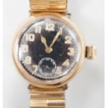 A gentleman's early 20th century 9ct gold Zenith military? manual wind wrist watch, with black