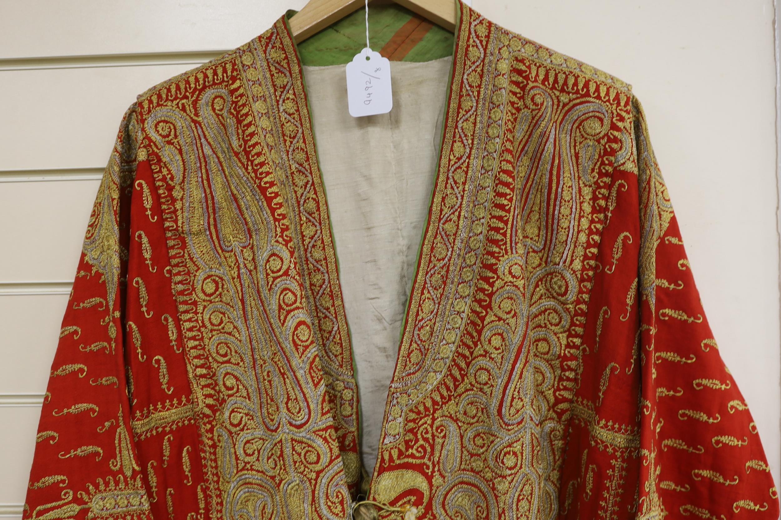 A 19th century fine wool coat, embroidered with gold and silver coloured metal threads in an all - Image 2 of 3