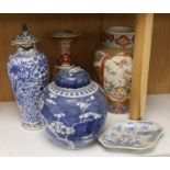 A Chinese blue and white lidded baluster vase, with damage, together with a lidded prunus ginger