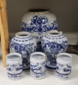 A set of three 18th century Delft drug jars, a similar large Violetta jar, Duyn mark, and a pair