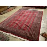 A Pakistan Bukhara, handknotted carpet, 318 x 219cm