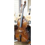 A Hungarian double bass with label to interior reading 'Golden Strad, imported by Boosey & Hawkes,