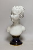 Tharaud Limoges France, a biscuit porcelain bust of a girl, 40cm