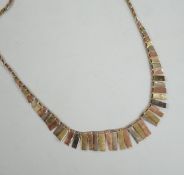 A modern three colour 9ct gold fringe necklace, 40cm, 6.7 grams.