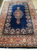 An Indian blue ground carpet, 260 x 167cm