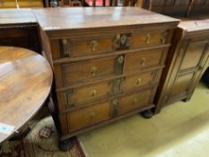 A 17th century style oak geometric four drawer chest, width 97cm, depth 54cm, height 99cm