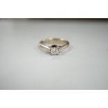 A modern Zen 18ct white gold and solitaire princess cut diamond set ring, the stone weighing 0.52ct,