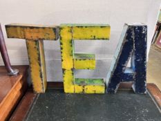 Three painted iron letters spelling TEA, height 50cm