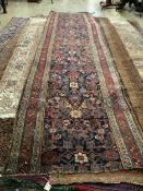 A Persian Bidjar blue ground runner, 433 x 107cm