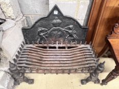 A cast and wrought iron fire grate, width 92cm, depth 42cm, with cast iron heraldic fire back,