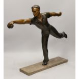 A French Art Deco spelter figure 'Petanque player' 60cm wide, 50cm high
