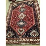 And Iranian Gashshghai super red ground carpet, 291 x 208cm
