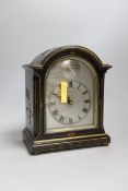 A reproduction chinoiserie cased mantel clock marked Tempus Fugit, 26cm