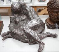 A large heavy cast metal abstract figure group, recumbent couple, 67cm