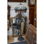 A Tiffany style leaded glass and bronzed metal lamp standard, height 164cm