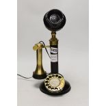 An early 20th century candlestick telephone