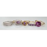 Five assorted modern 9ct gold and gem set dress rings, including diamond chip half hoop and amethyst