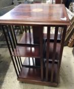 A reproduction mahogany revolving bookcase, width 50cm, height 79cm
