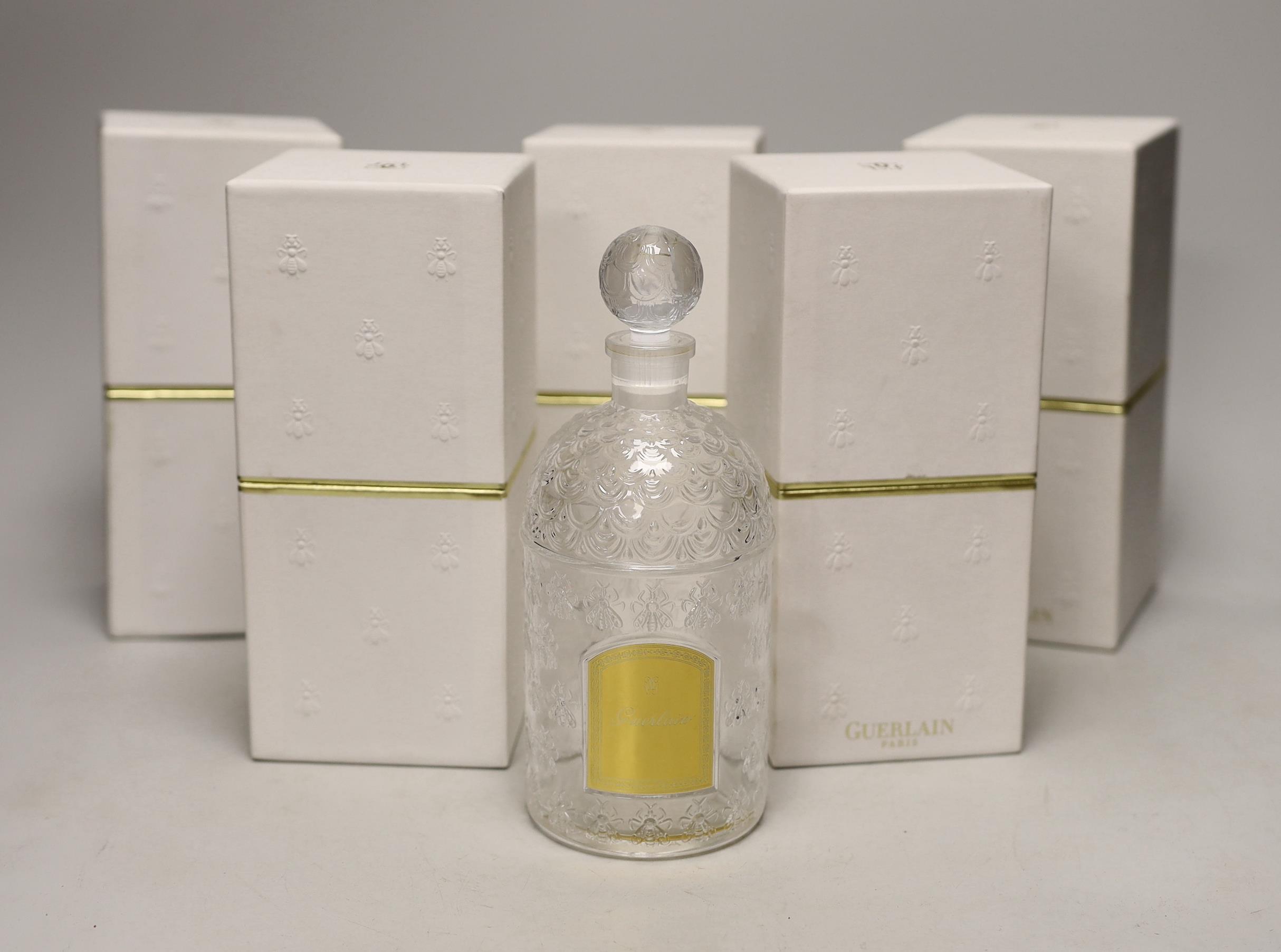 Five Guerlain empty perfume bottles (boxed)