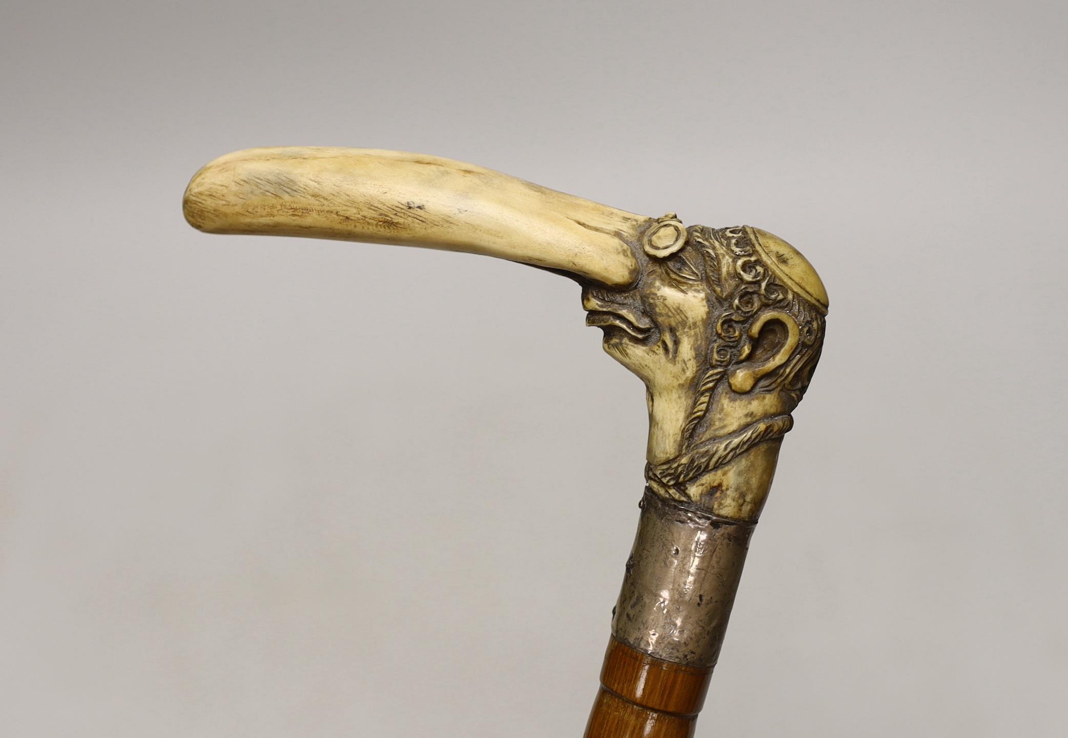 A stag horn handled walking stick with Jewish caricature, 81cm - Image 2 of 3