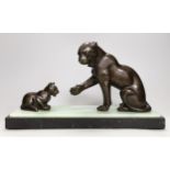 Irénée Rochard (French, 1906 - 1984). An Art Deco bronzed spelter ‘panther and cub’ group, on onyx