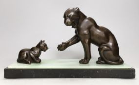 Irénée Rochard (French, 1906 - 1984). An Art Deco bronzed spelter ‘panther and cub’ group, on onyx