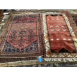 A Caucasian read ground rug, 197 x 120cm and a modern Caucasian style rug, 185 x 99cm