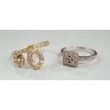 A modern 18ct gold and diamond chip set double scroll ring, size M and a modern 18ct white gold