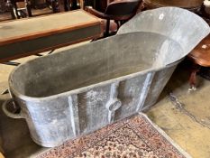 A 19th century French galvanised zinc bath tub, length 150cm