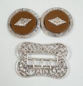 A Victorian silver belt buckle, H & A, Birmingham 1900, and a continental white metal mounted two