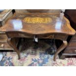 A 19th century Continental marquetry inlaid walnut occasional table, width 89cm