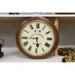 A Victorian double sided mahogany station / shop fusee timepiece, retailers name Gillett & Johnston,