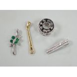 Three modern 18ct white gold and gem set pendants, including diamond chip set pierced drum shape and