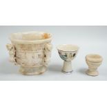 A Chinese burnt jade or hardstone censer, a stone cup and a doucai stem cup, censor 12cm high