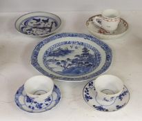 An 18th century Chinese export famille rose teacup and saucer, a similar blue and white octagonal