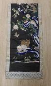 An unusual inscribed 19th century Chinese silk embroidered wall hanging, depicting animals, birds